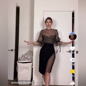 Elpis pencil skirt with sheer polka dot detail as worn by madeleine white